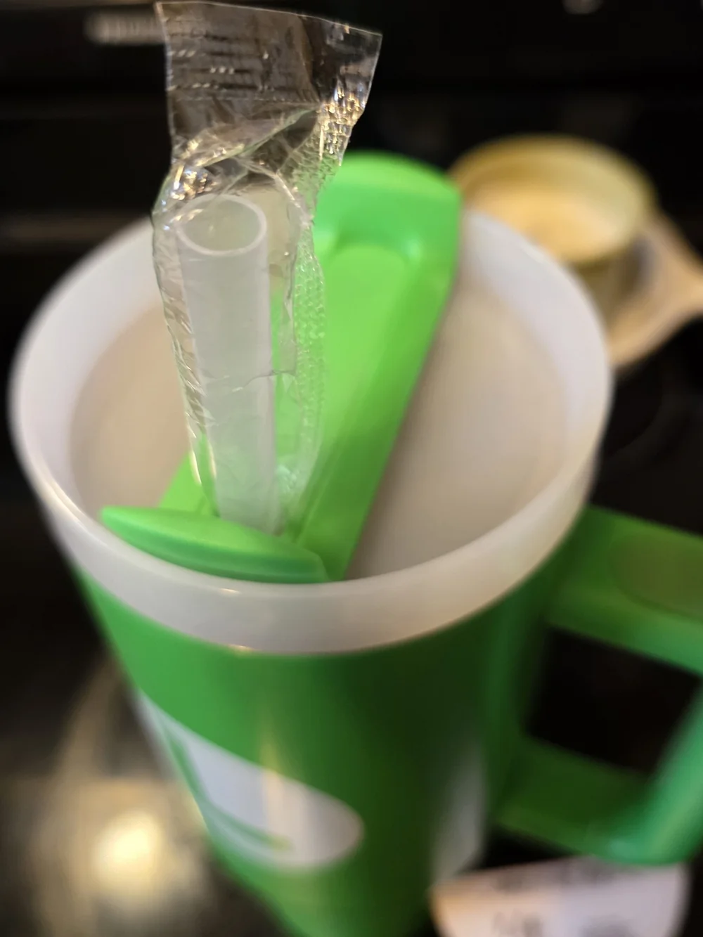 Nintendo Green Travel Mug with White L Logo and Straw